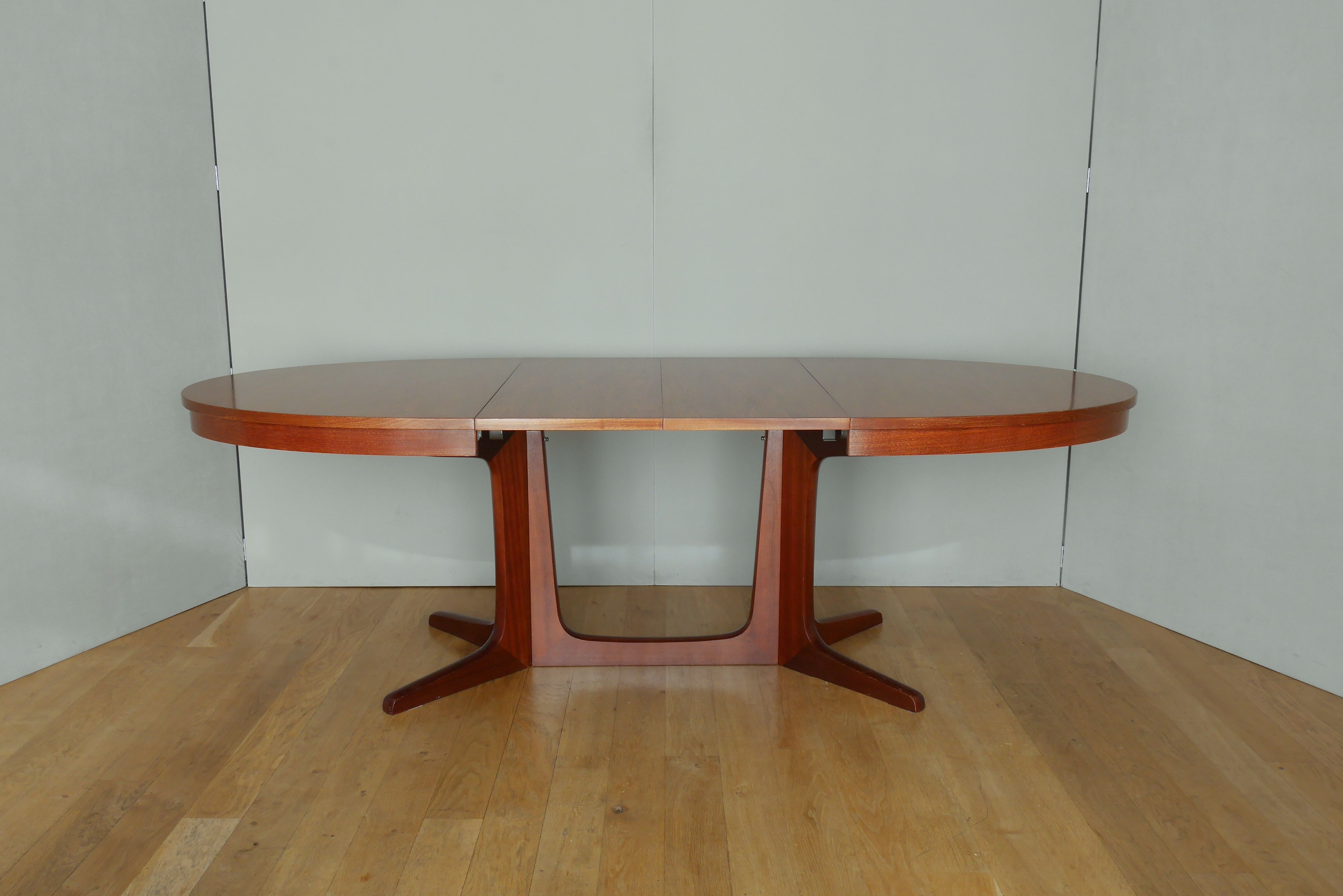 Scandinavian style oval table in central foot with extensions