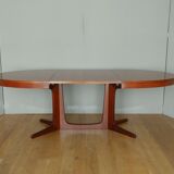 Scandinavian style oval table in central foot with extensions