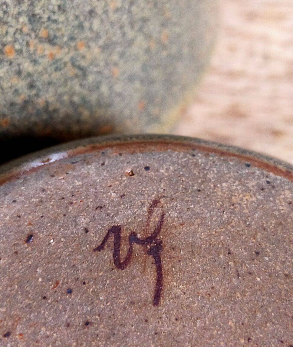 Three nesting pottery salad bowls in glazed stoneware