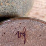 Three nesting pottery salad bowls in glazed stoneware
