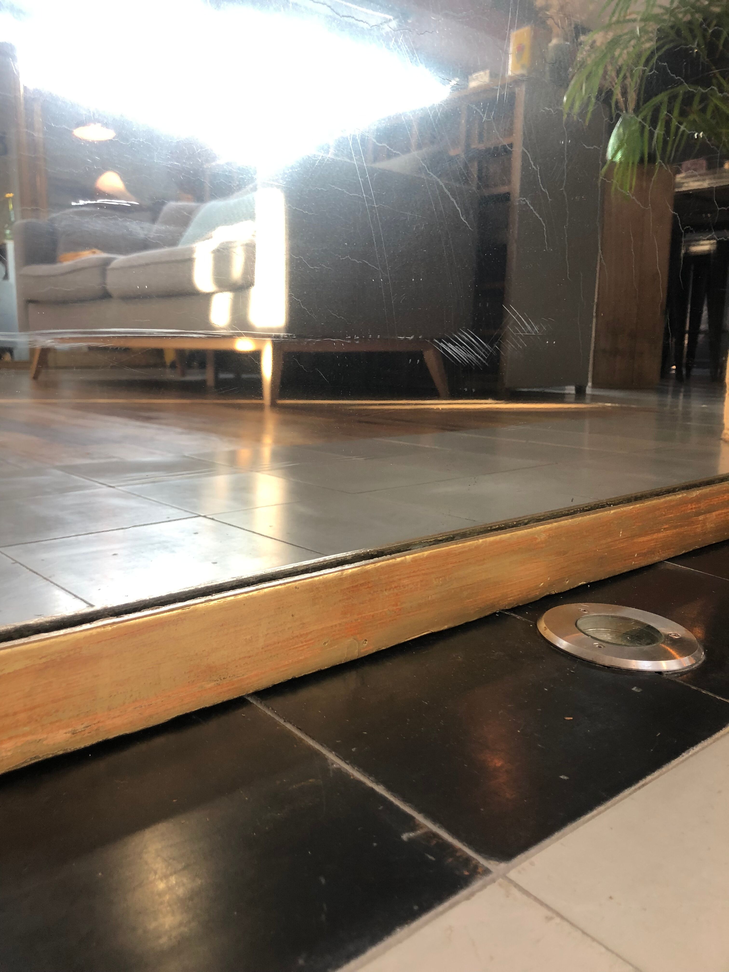 Mirror period 19th gilded with gold leaf 158.5cm / 113cm mercury ice pricked, parquet on the back.