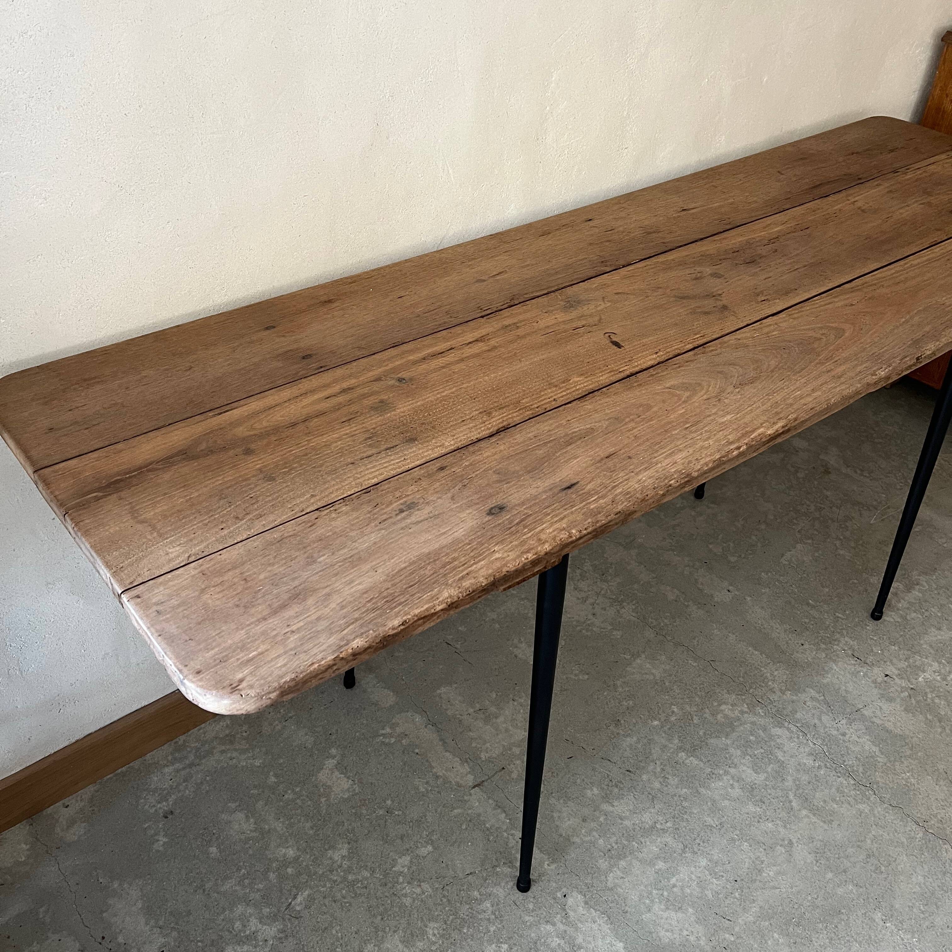 Wooden table, black metal legs