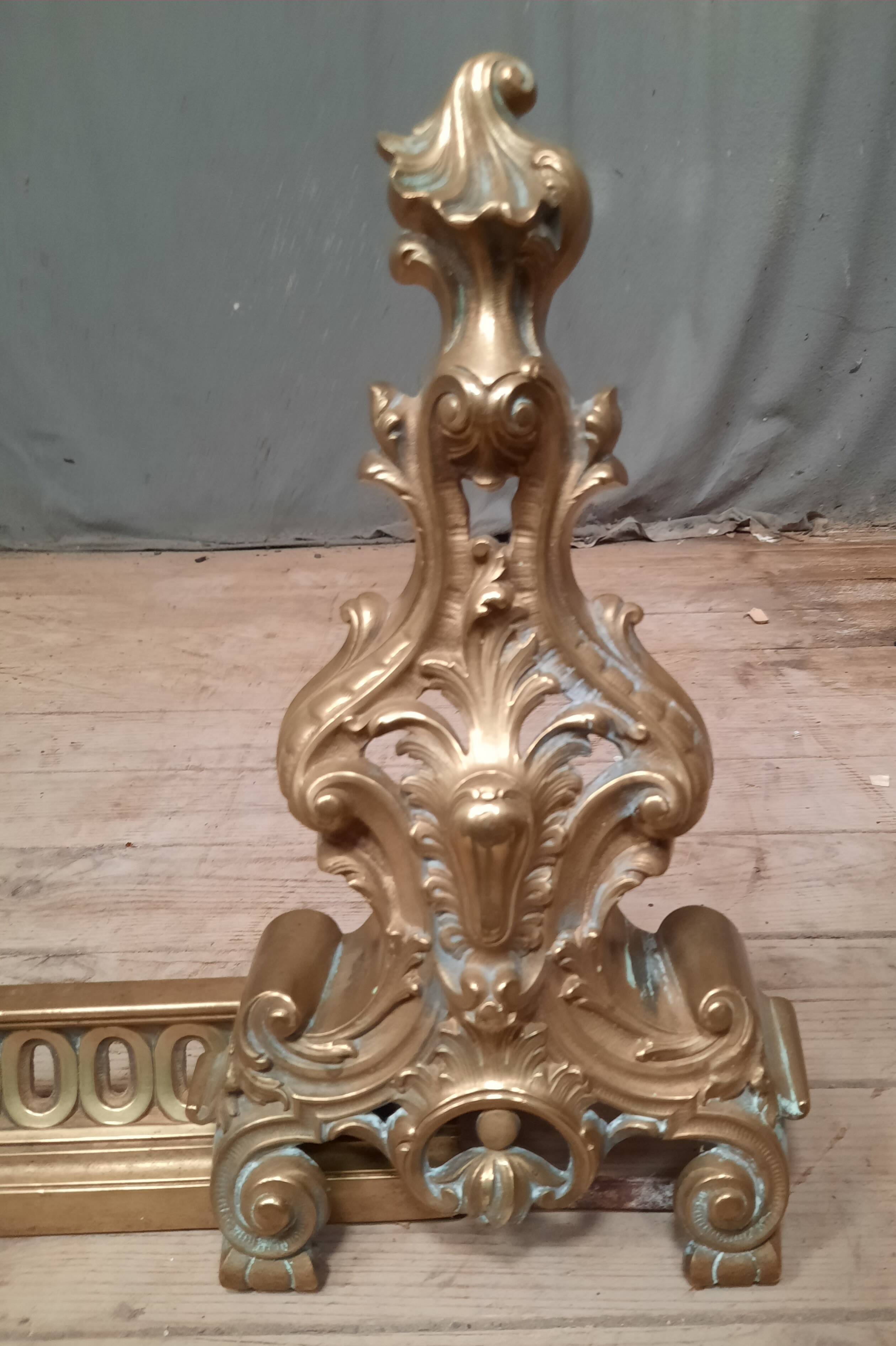 Barre de foyer en bronze doré