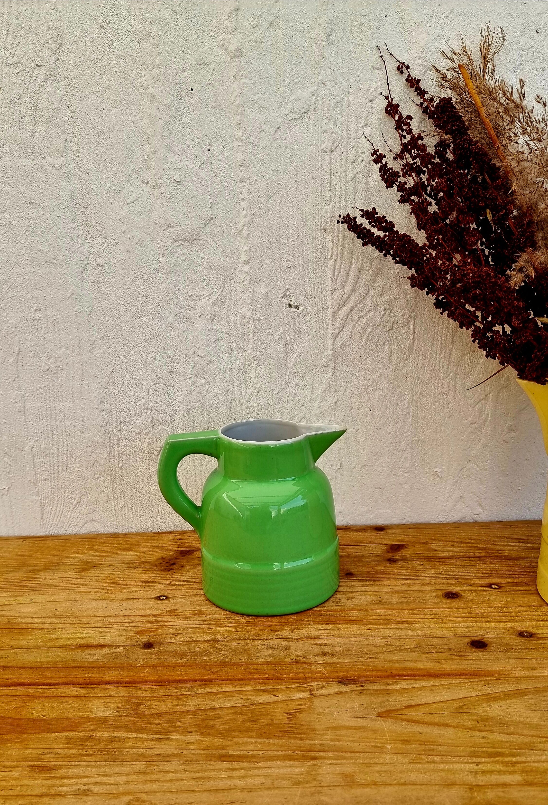 Vintage green earthenware pitcher