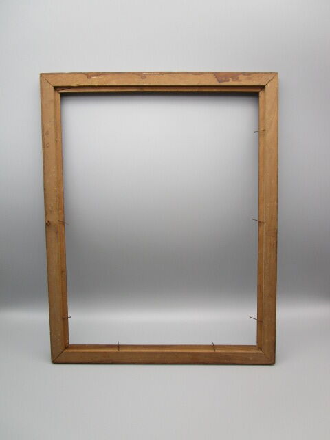 Old frame in worked wood