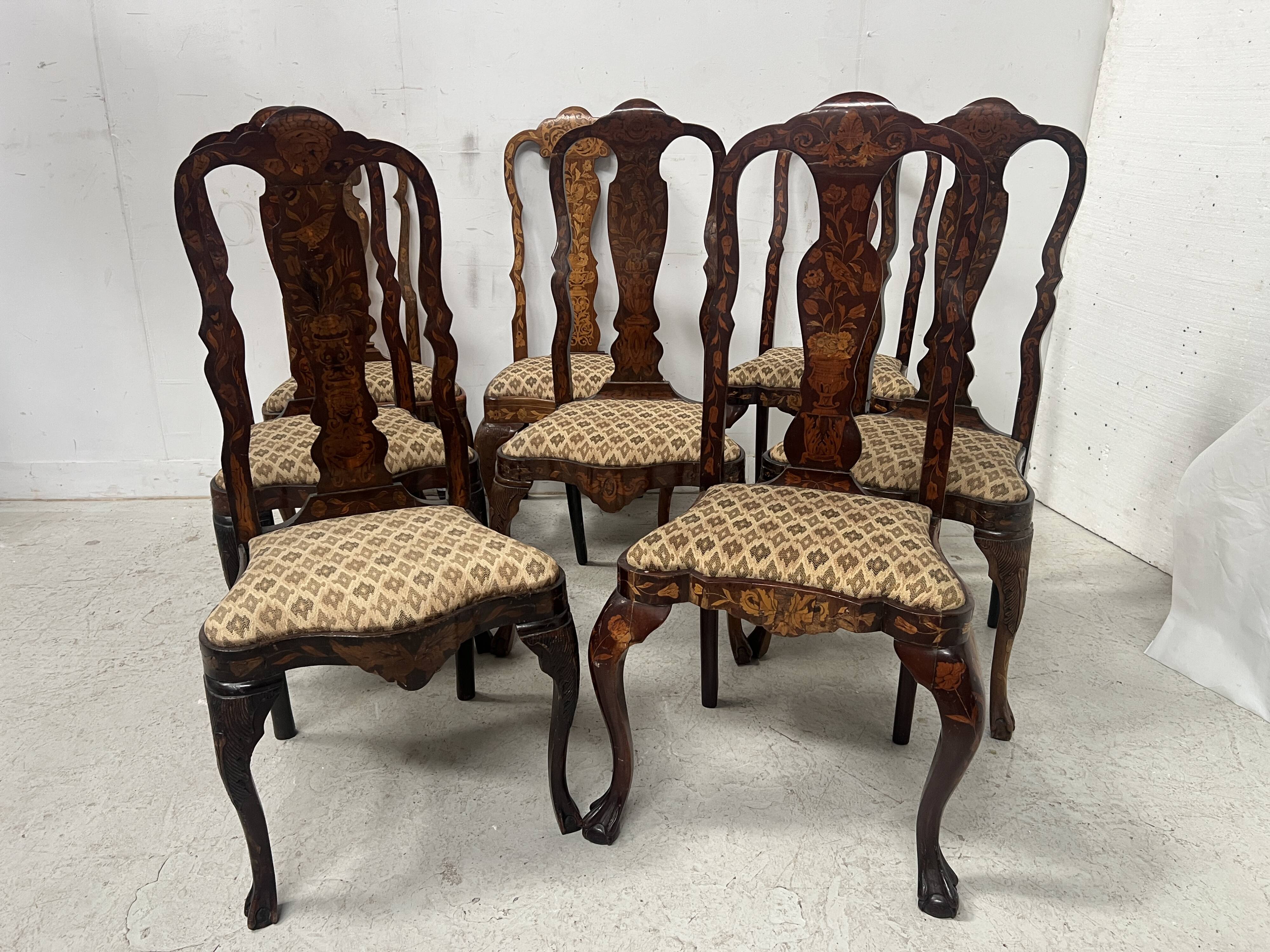 Set of eight Dutch marquetry chairs from the 19th century.