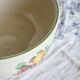 Vintage round earthenware salad bowl with fruit pattern