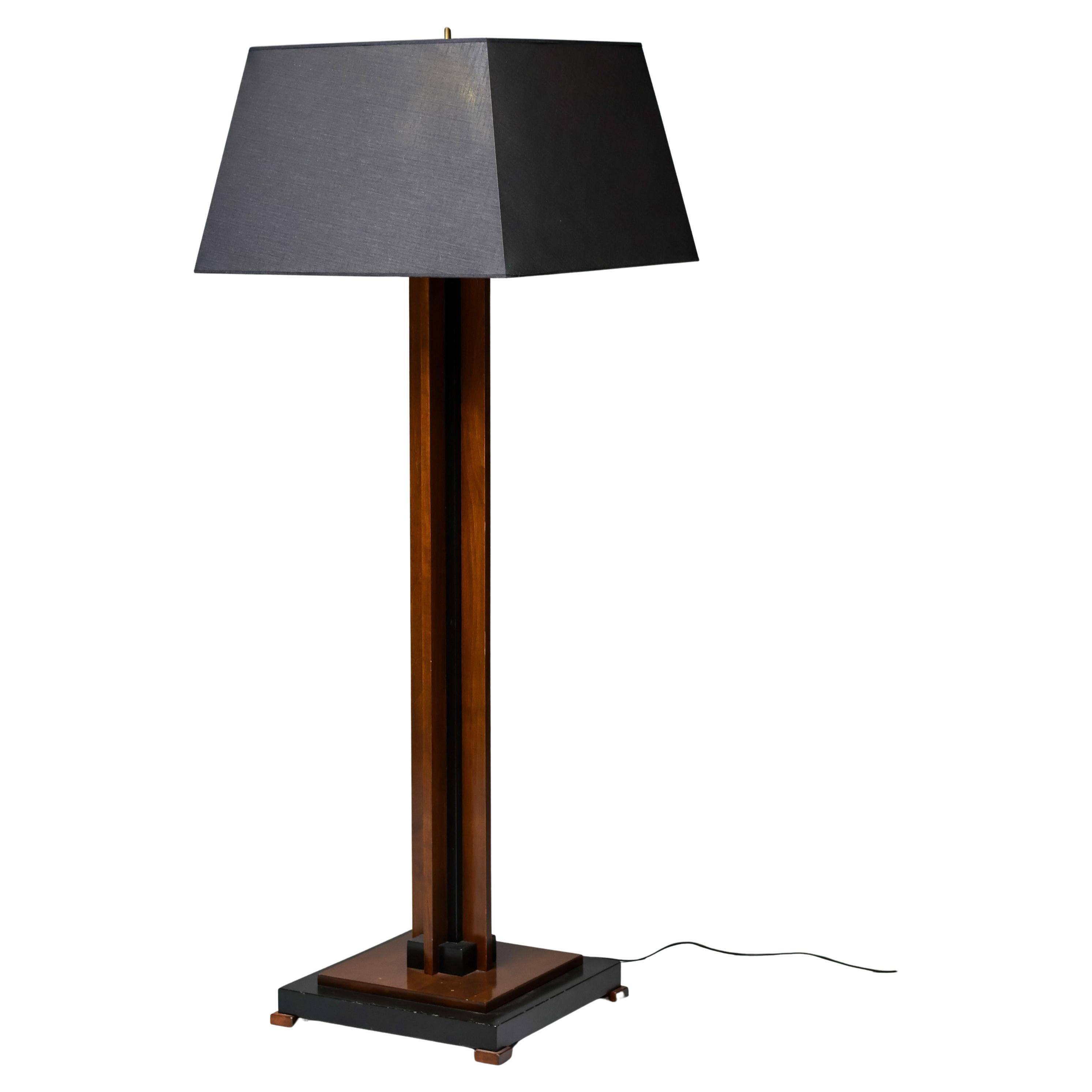 Amsterdam School floor lamp in partially ebonised cherry with a black linen shade.