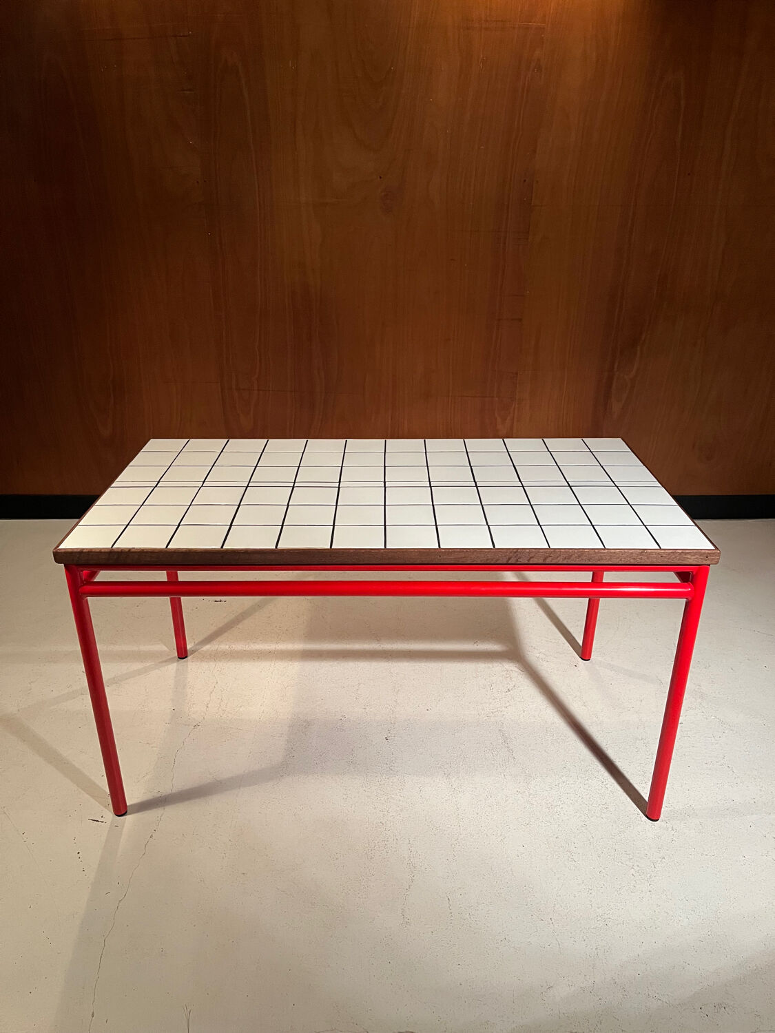 Custom modernist table, steel and earthenware.