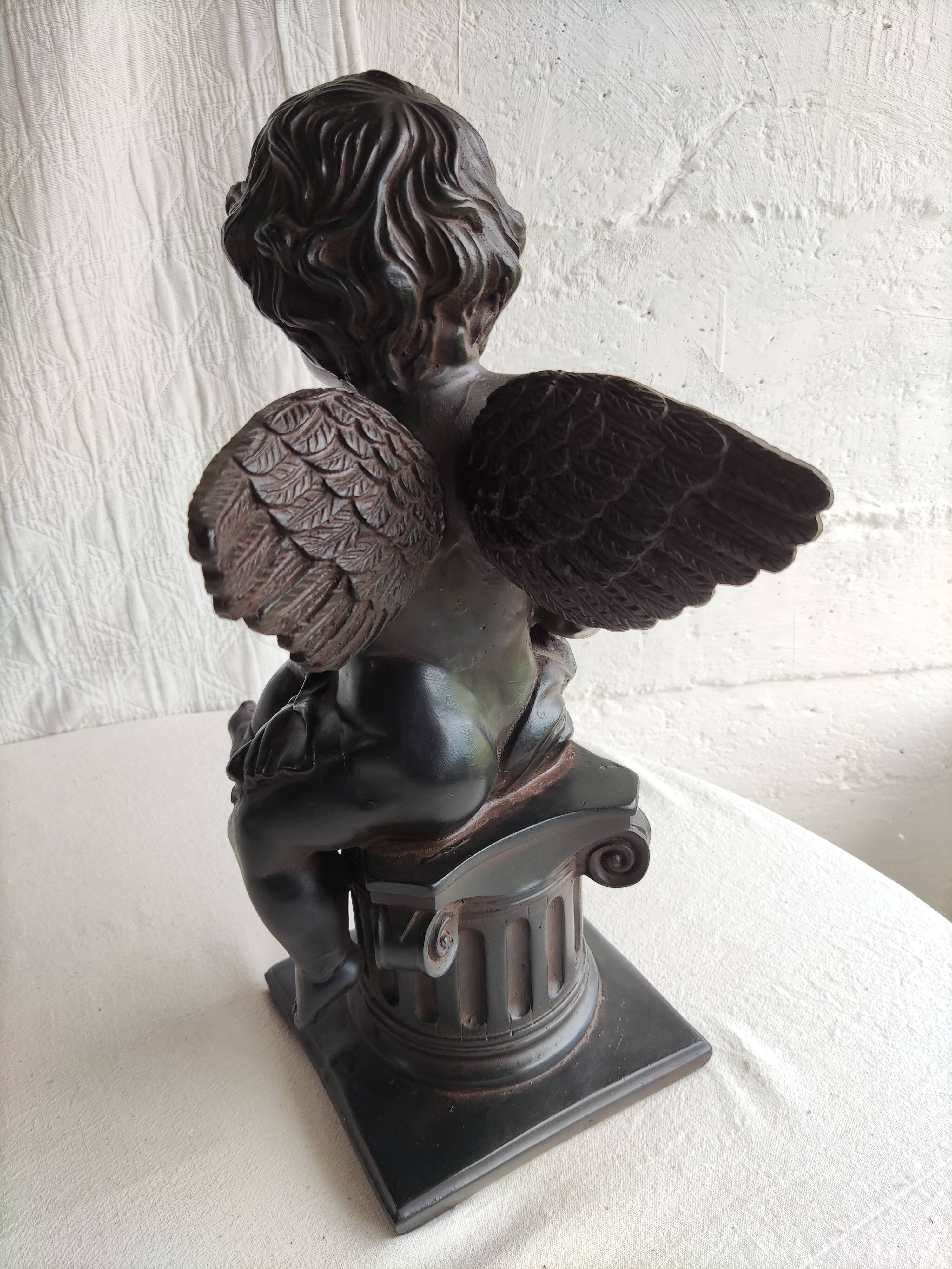Patinated plaster sculpture - cherub