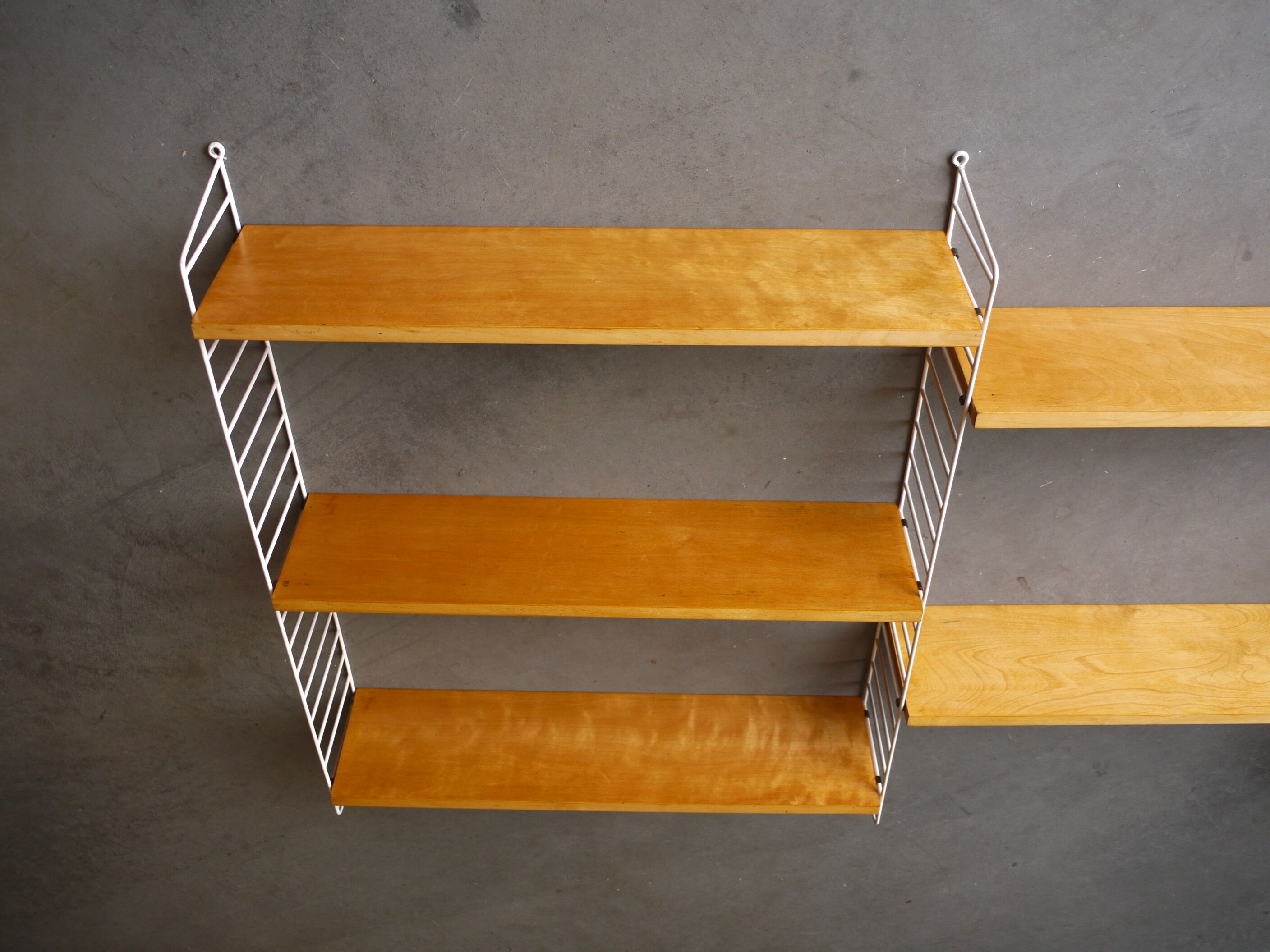 Vintage wall shelving unit by Nisse Strinning for String AB. 1950s