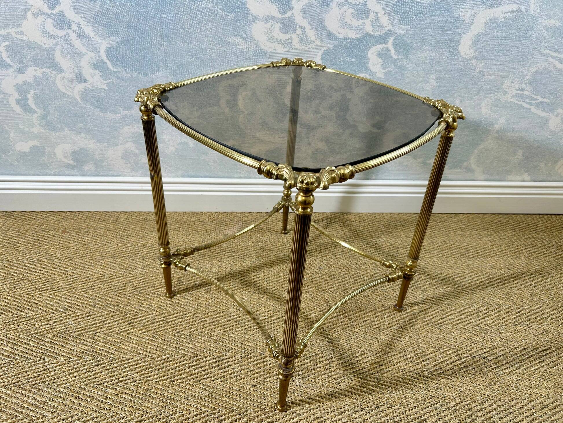 Small side table with a smoked glass top, Hollywood Regency.