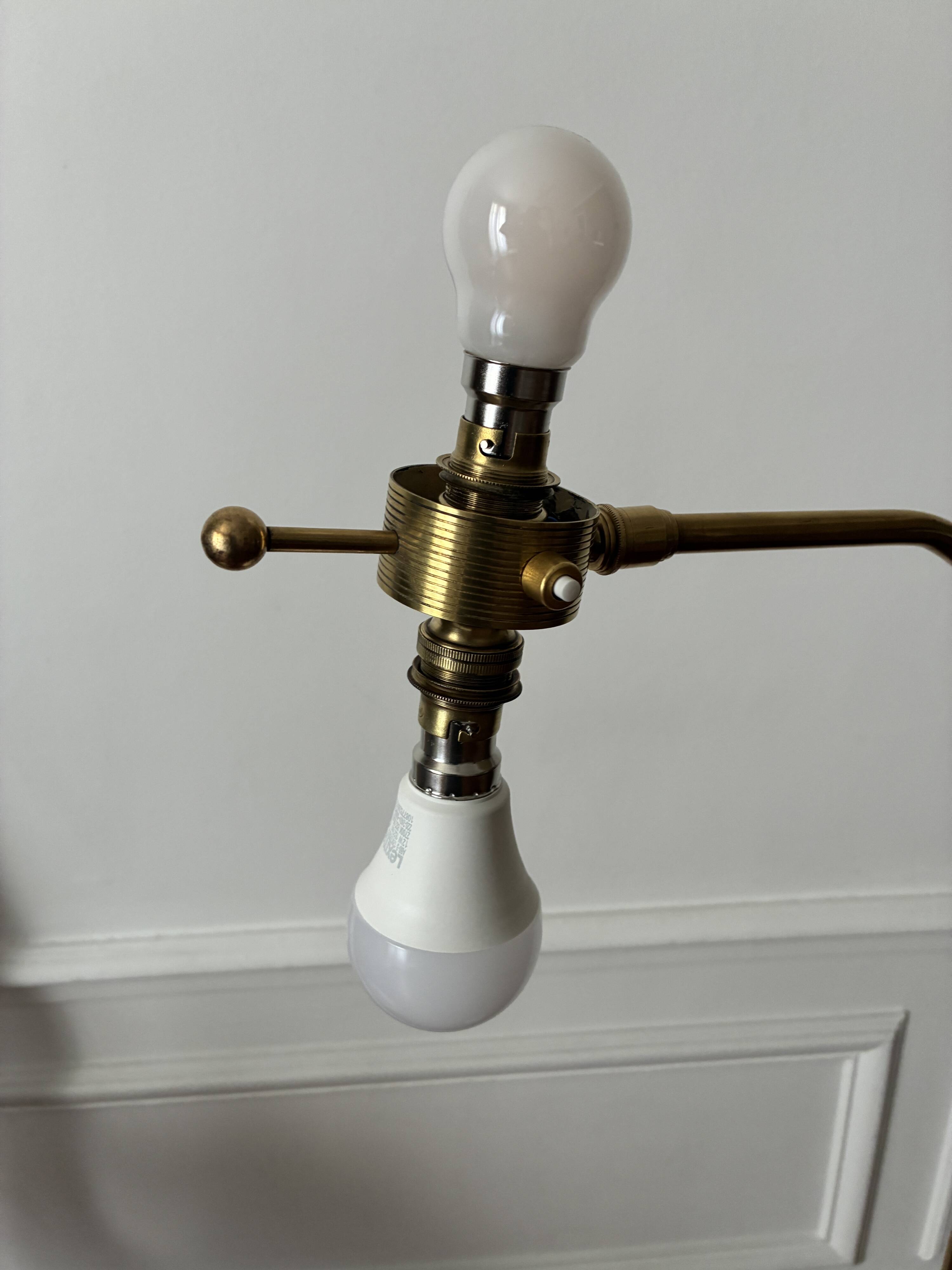 Adjustable Diabolo floor lamp in brass - 1950s