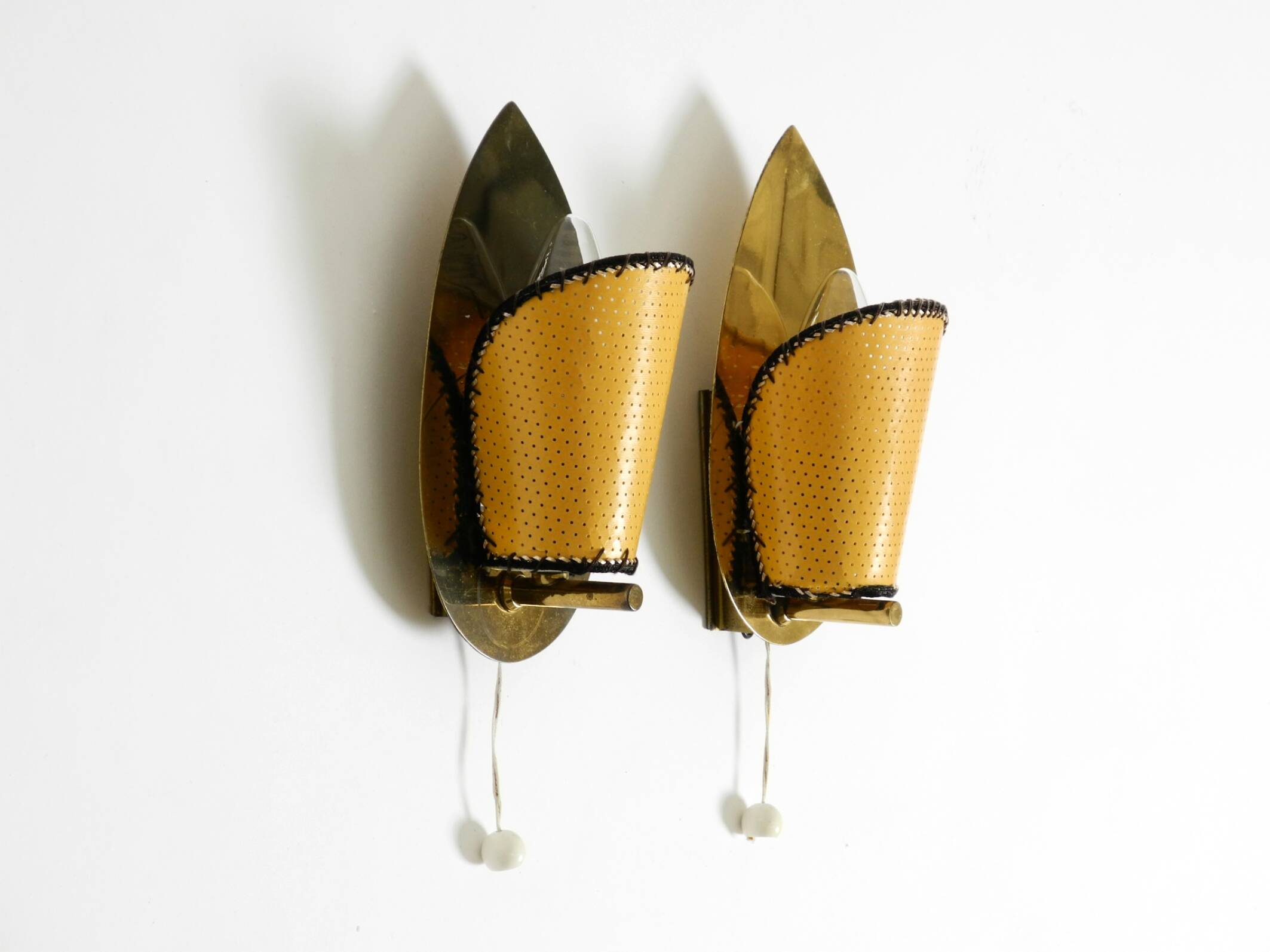Two enchanting original Mid Century Modern brass wall lamps