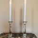 Pair of antique candle holders in transparent glass