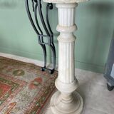 White marble column – sculpted base