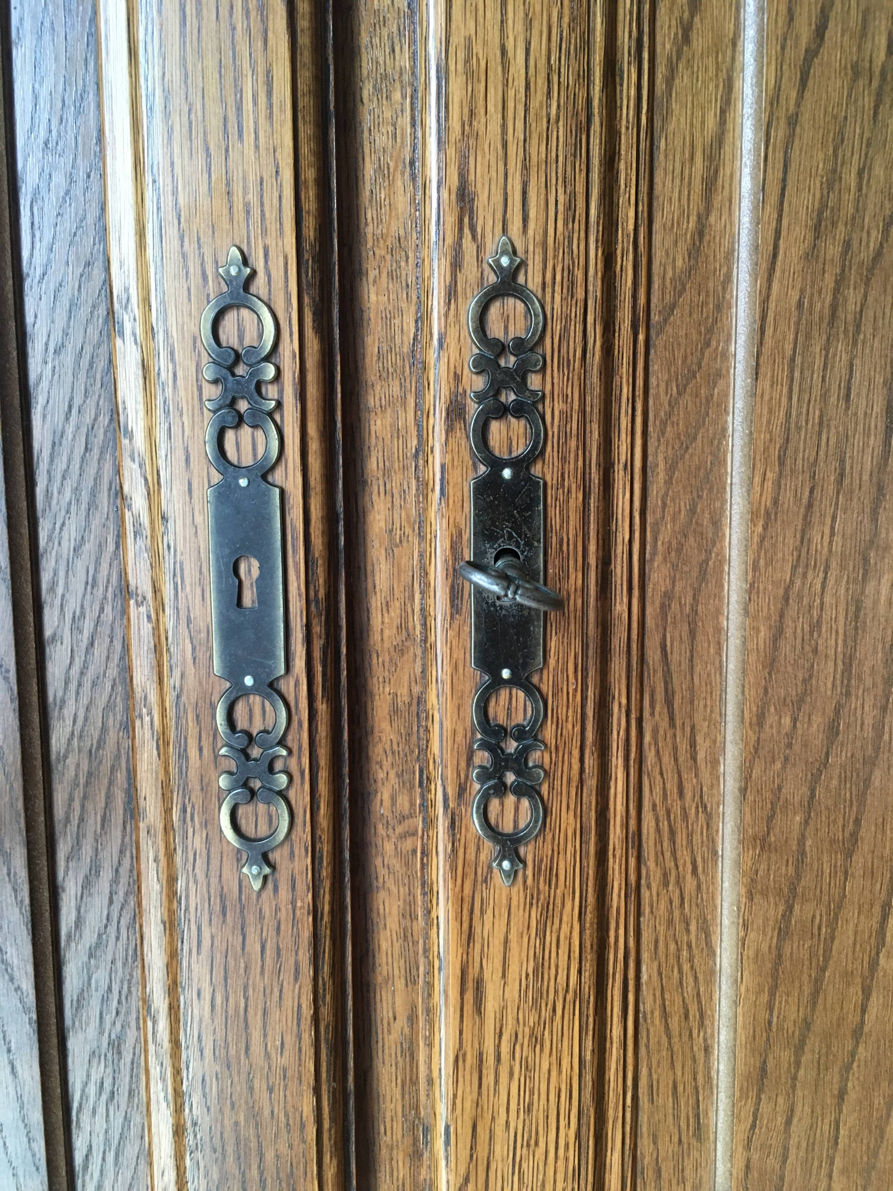 Solid oak wardrobe, four doors with keys.