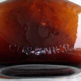 Ancienne bouteille Cusenier verre bullée marron