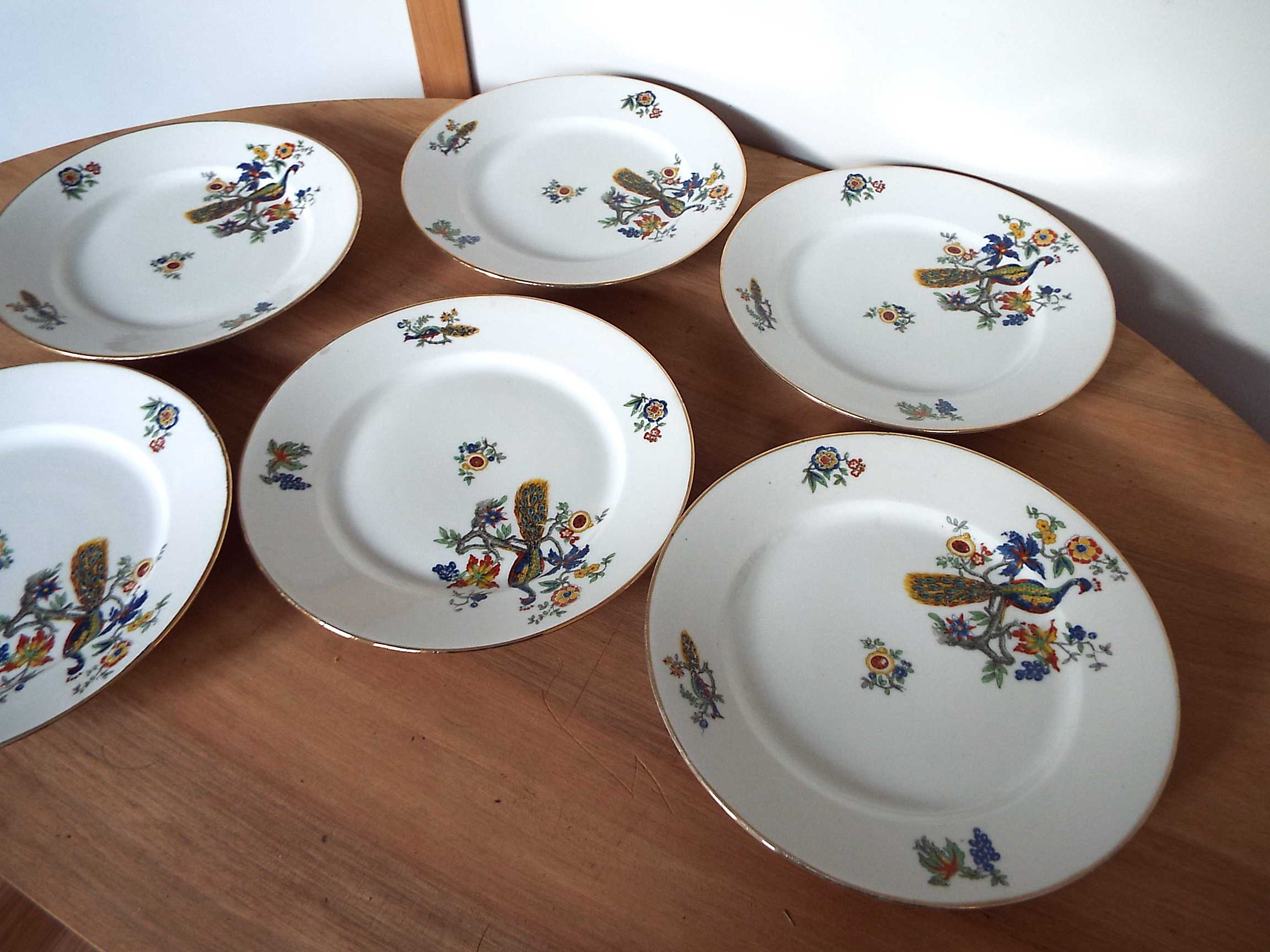6 flat porcelain plates peacock