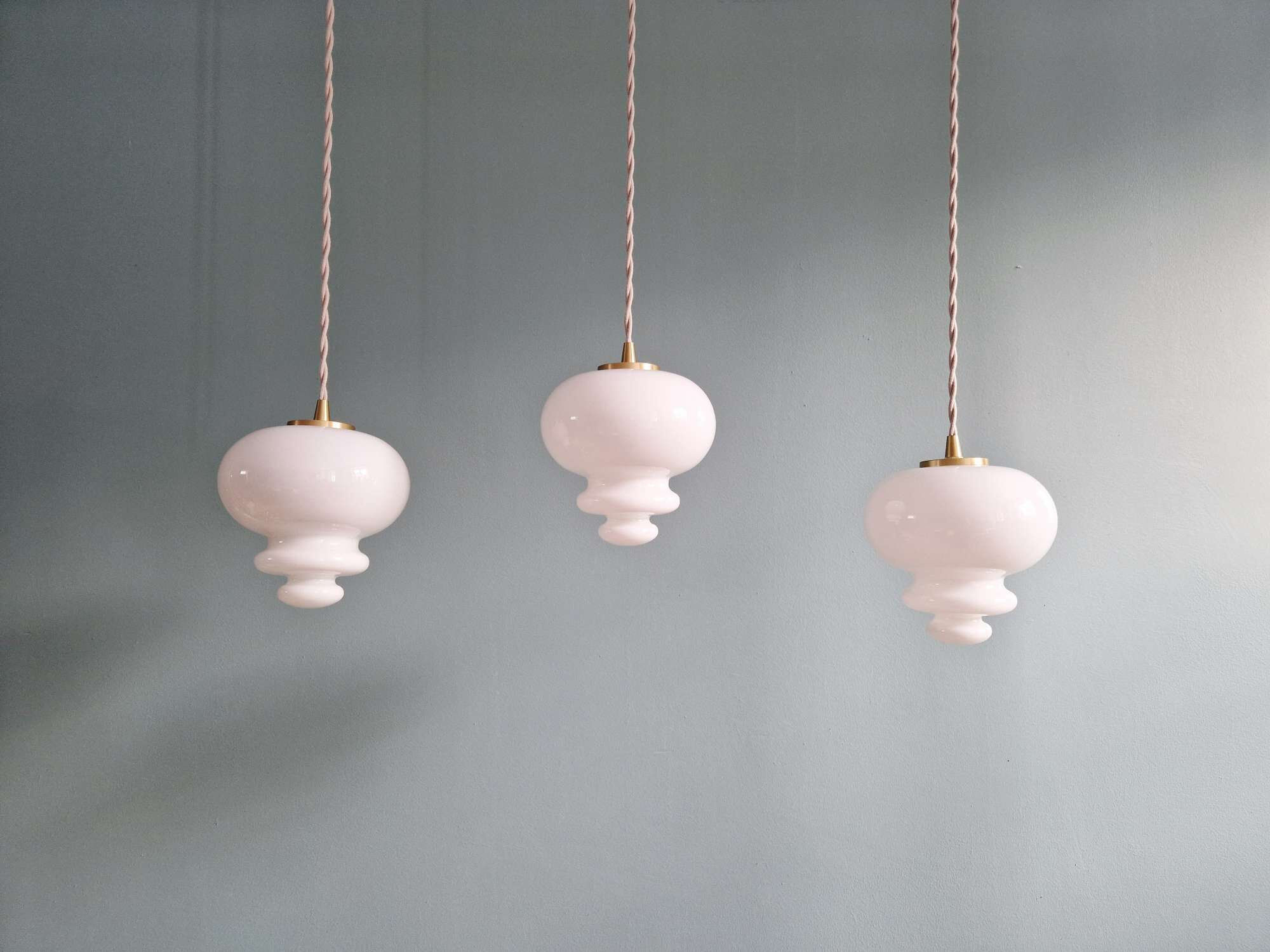 Scandinavian trio of suspensions in white opaline, 1960s