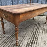 Antique cherry farmhouse table with 2 drawers and 1 pull-out