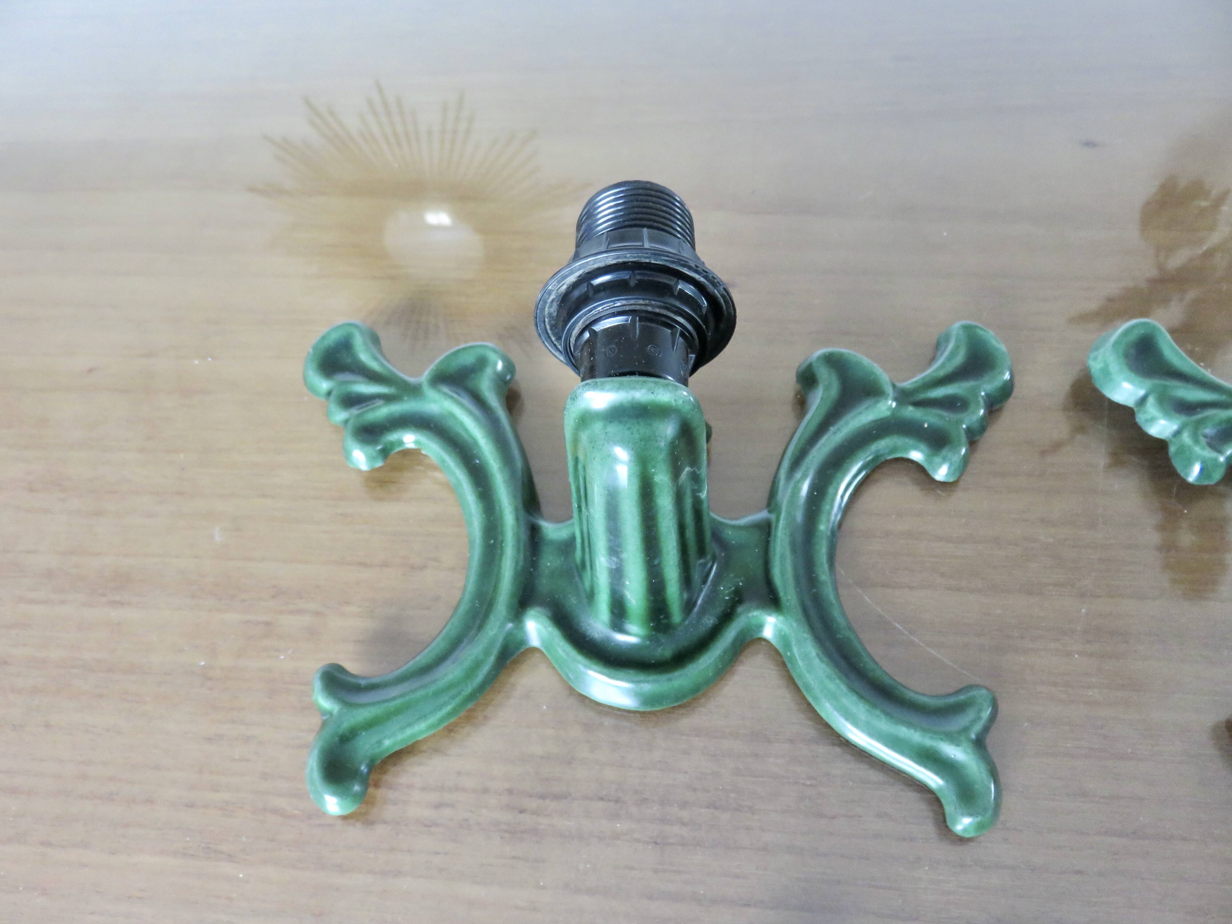 Series of 3 green enameled cast iron wall lights from the 30s and 40s