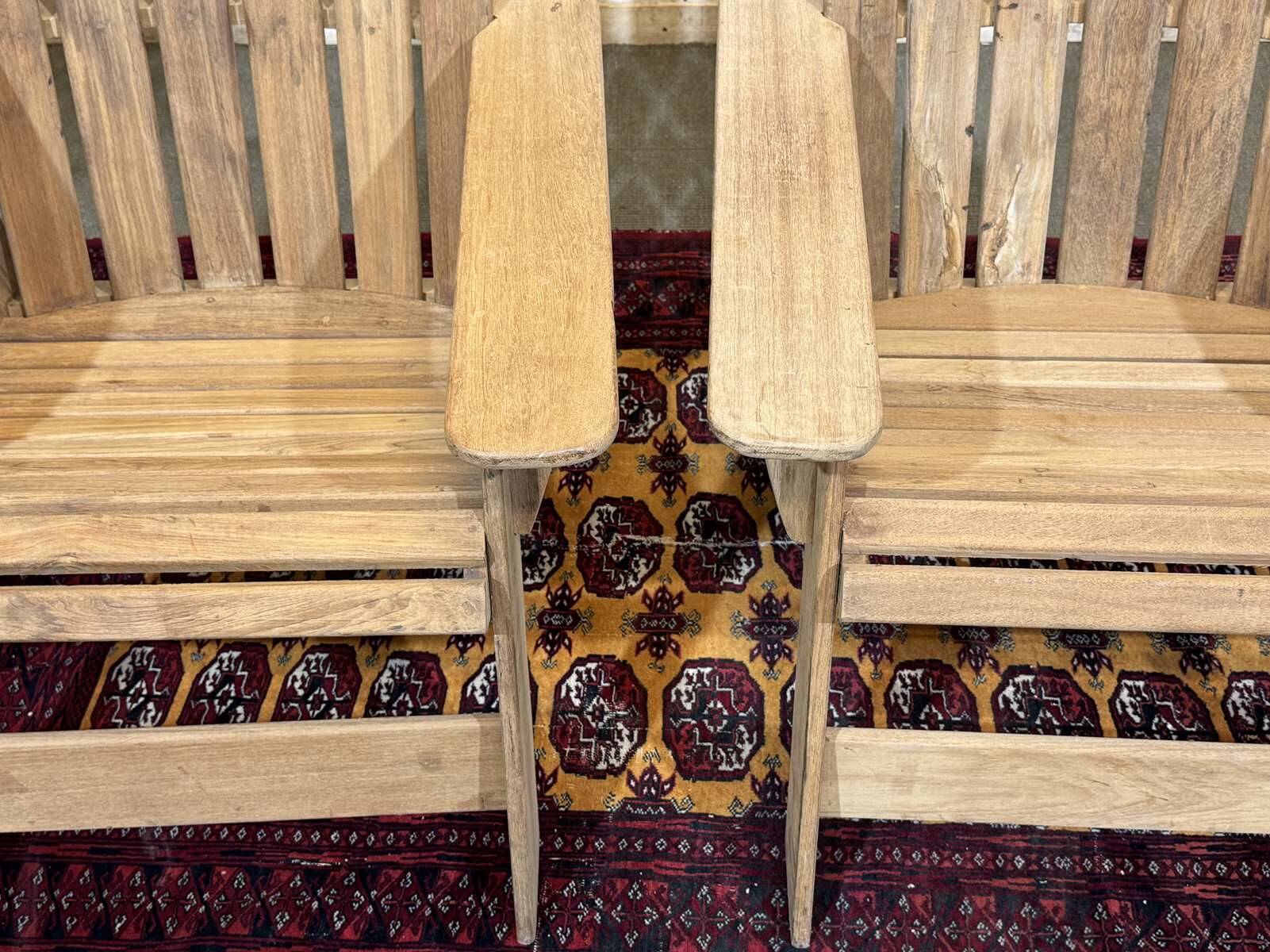 Pair of Indian teak armchairs