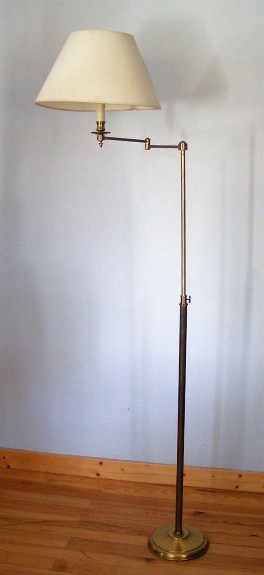 Articulated brass floor lamp