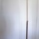 Articulated brass floor lamp
