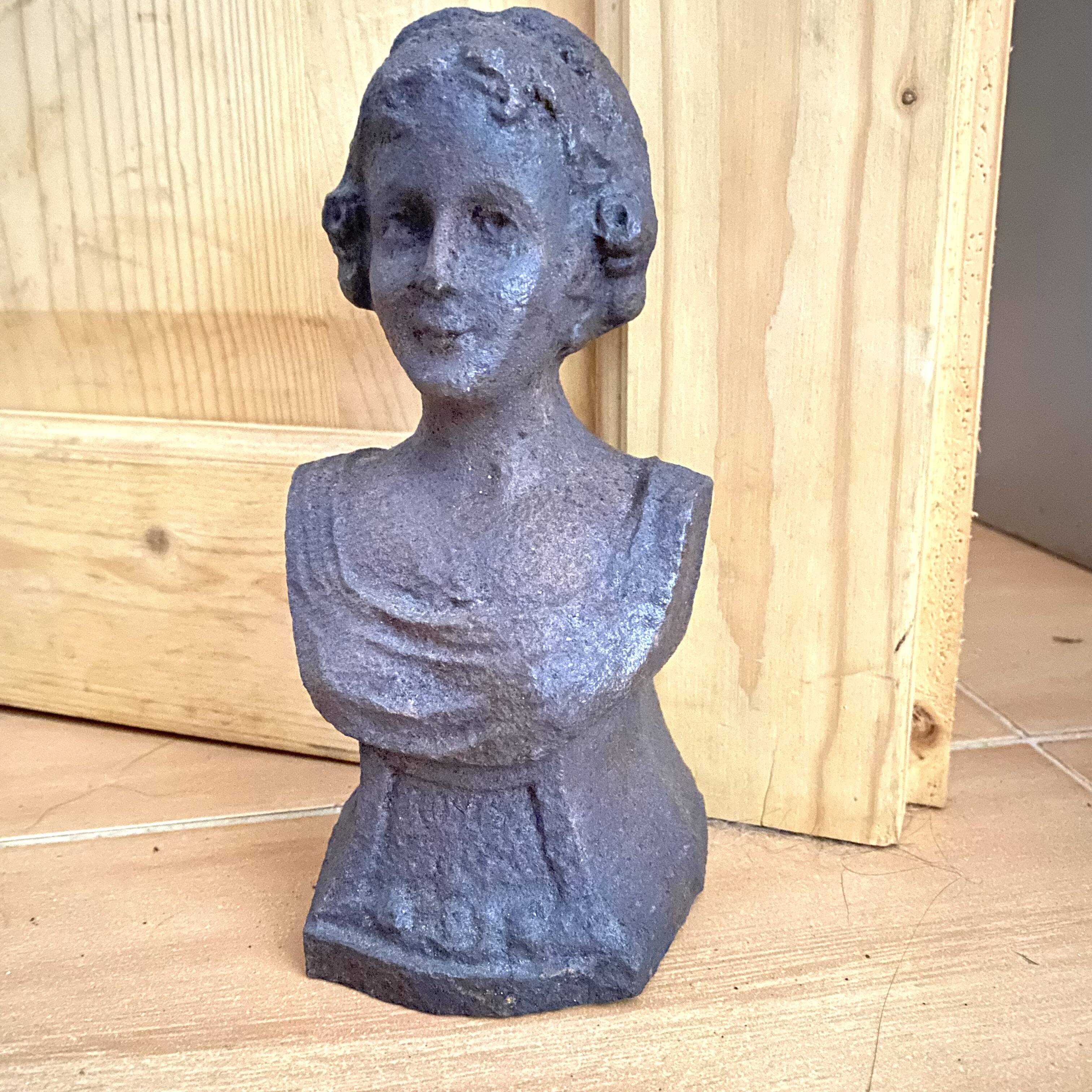 Cast iron bust door stop or bookend