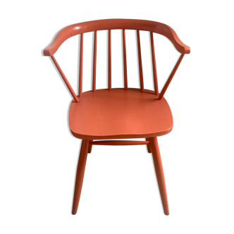 Coral armchair/terracotta wood