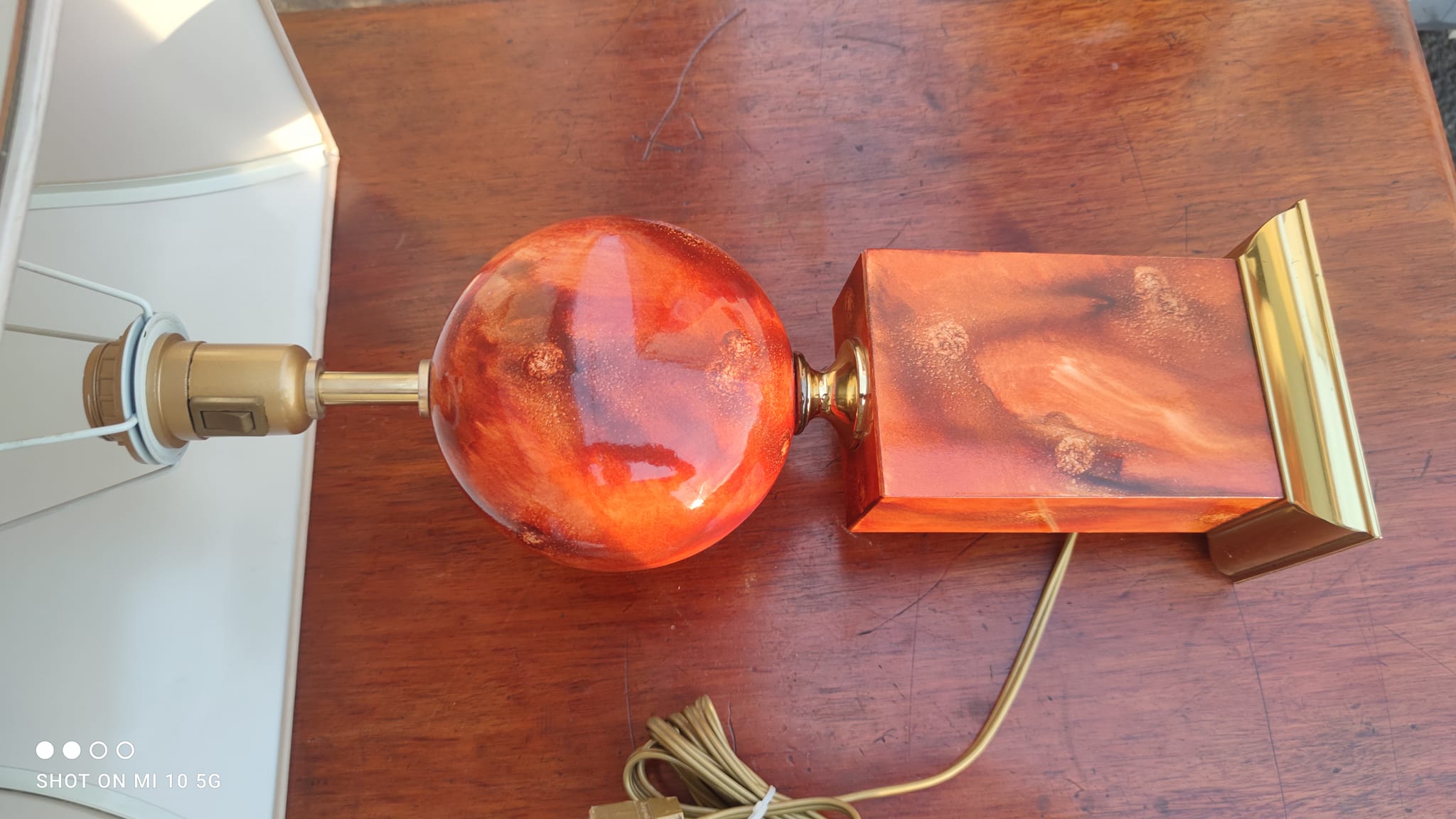 Lamp circa 1970 in iron and lacquered wood as well as bronze