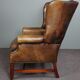 Fauteuil en cuir de vachette patiné