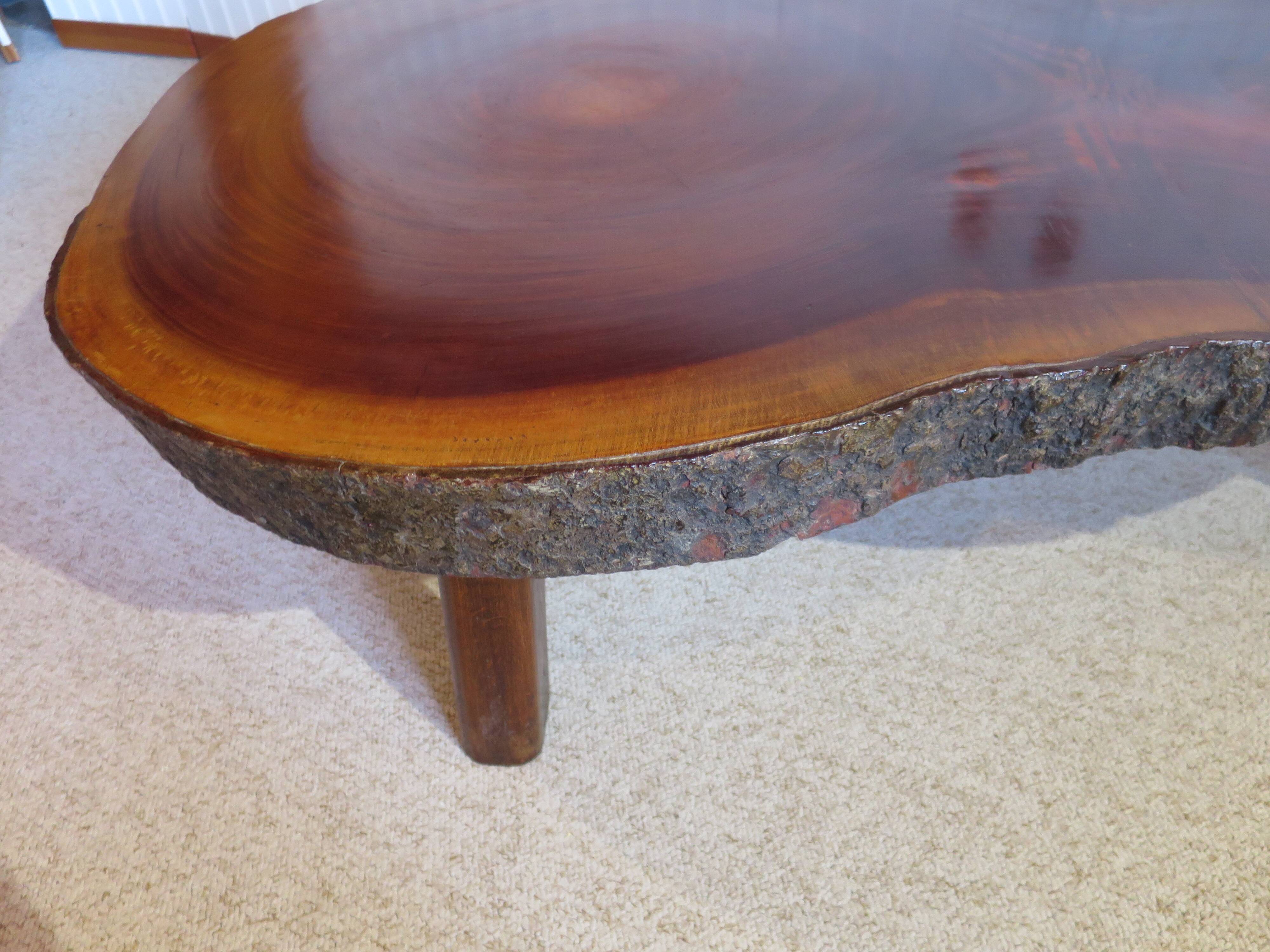 Tripod coffee table - solid okoumé wood - organic shape - brutalist style