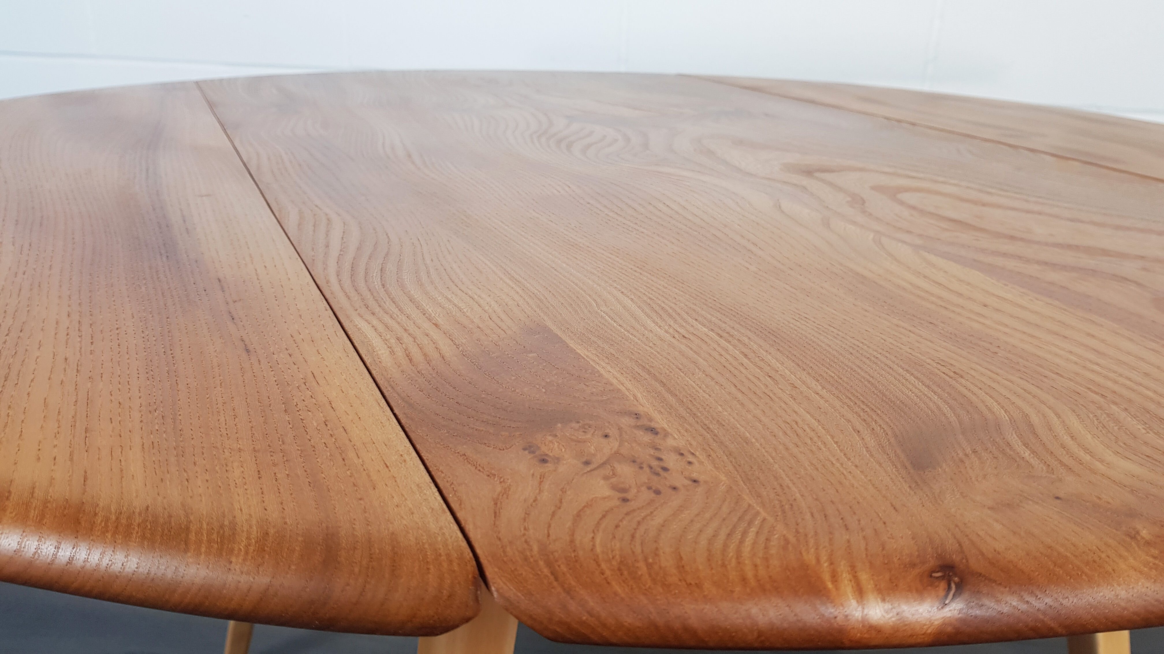 Ercol round drop leaf dining table, 1960s