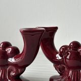 Pair of 1950s burgundy earthenware candlesticks