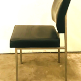 Suite of eight vintage chairs in chrome and imitation leather XX century
