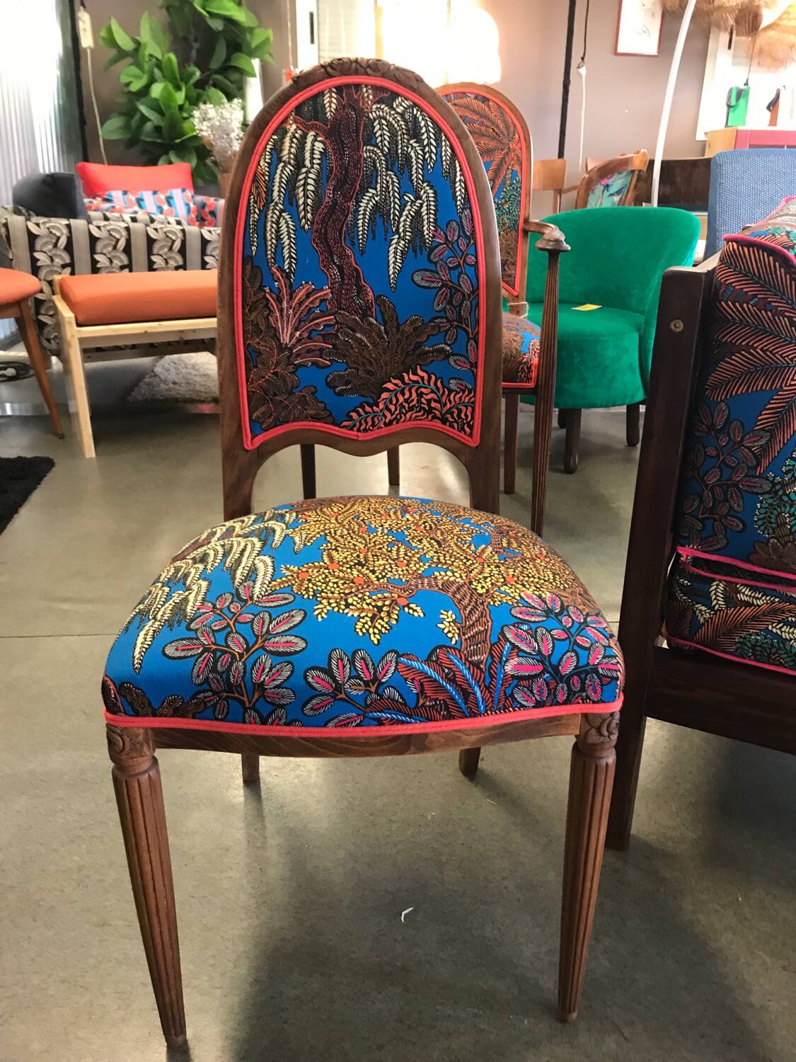 Art Nouveau chair with floral fabric and carved wood