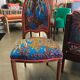 Art Nouveau chair with floral fabric and carved wood
