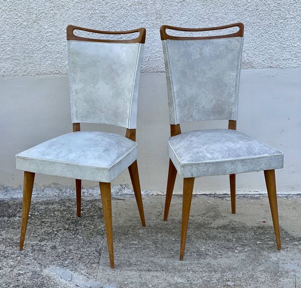 Paire de chaises pieds compas vintage 1960 bois et simili-cuir blanc