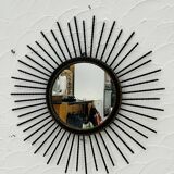 Vintage black and gold metal sun mirror from the 1960s.