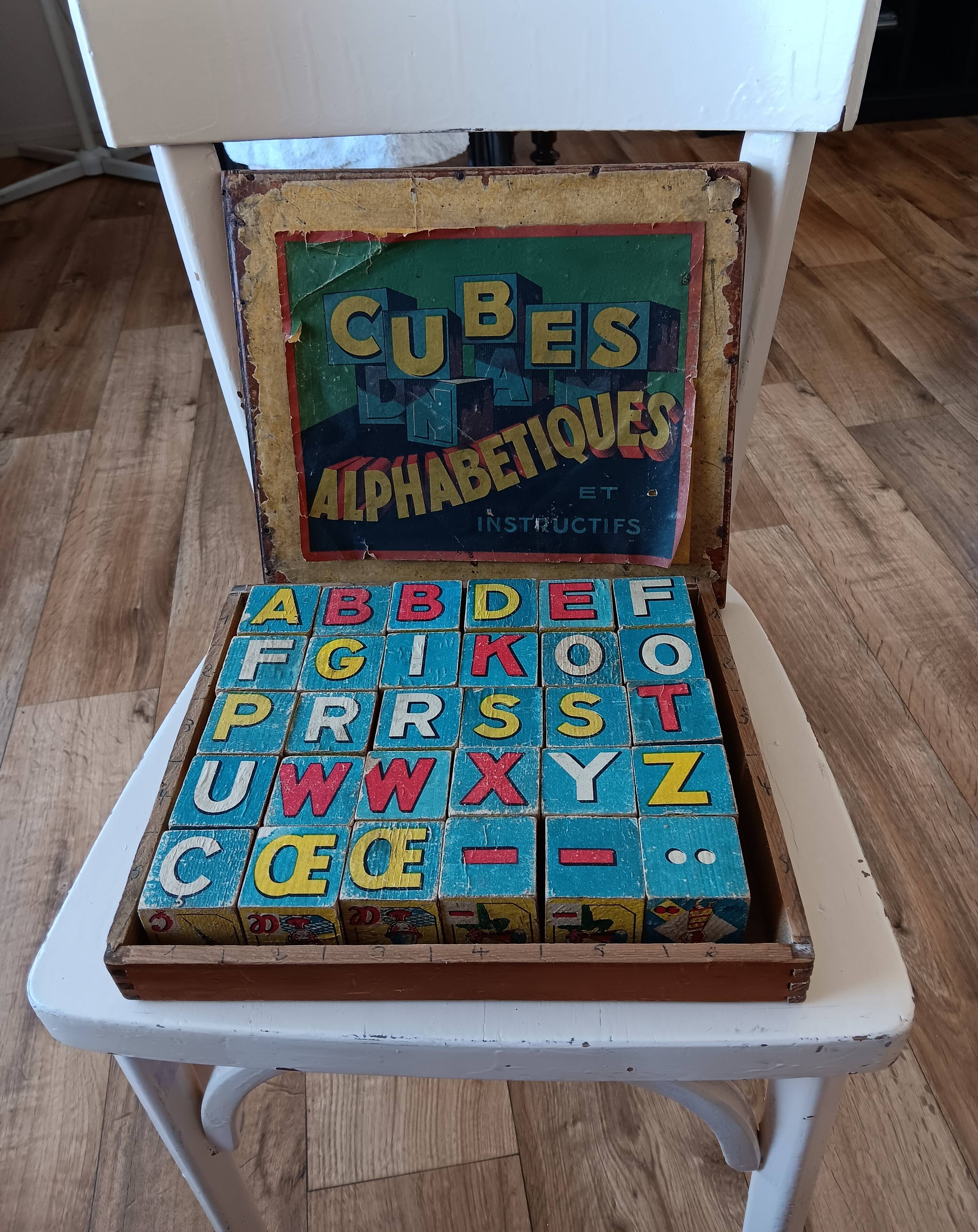 Instructional alphabetical cubes from the early 20th century.