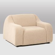A pair of large and comfortable beige fabric armchairs. Contemporary.