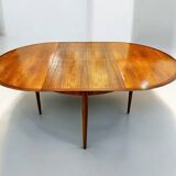 Extendable teak dining table