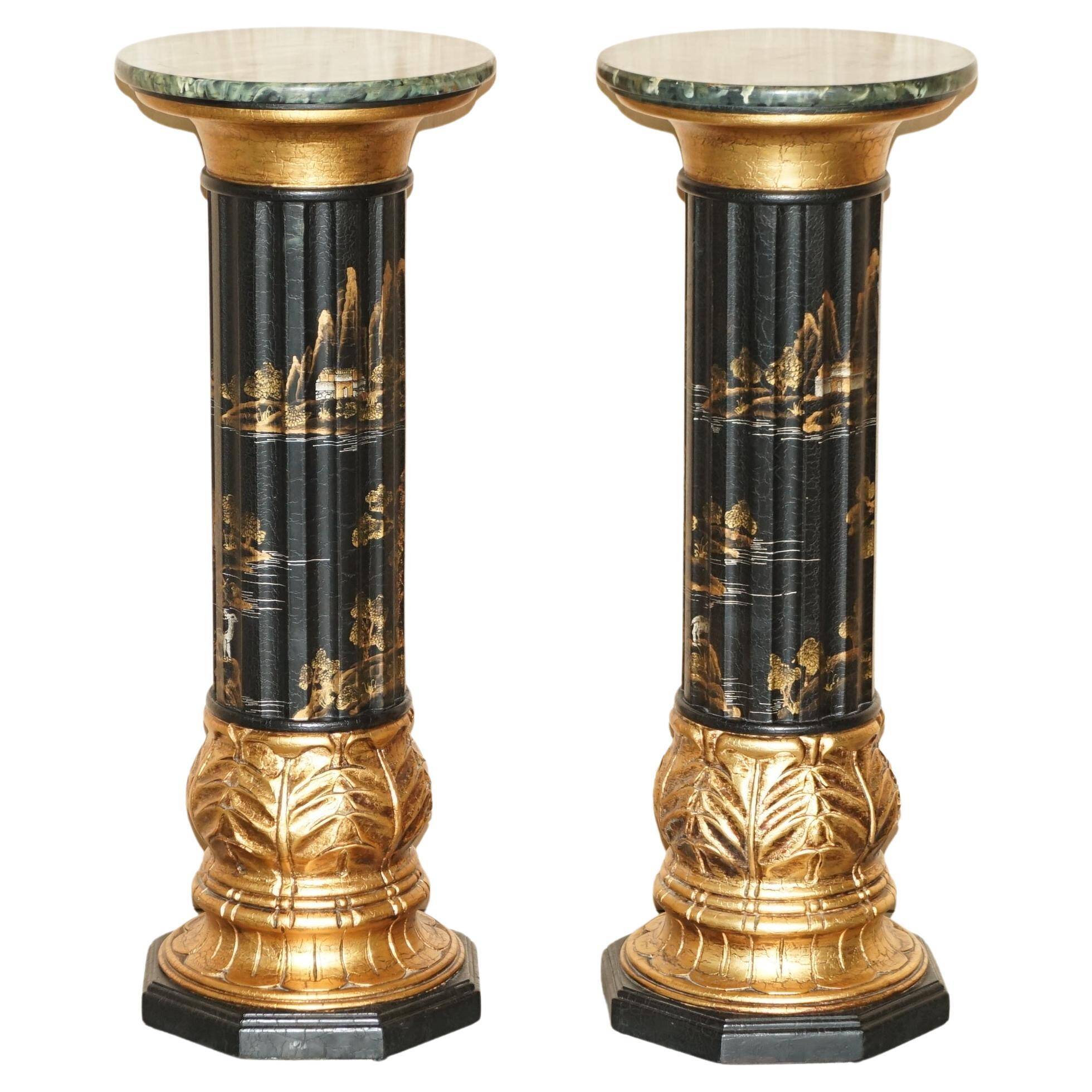 Pair of lacquered torchère columns in Chinoiserie neoclassical style.