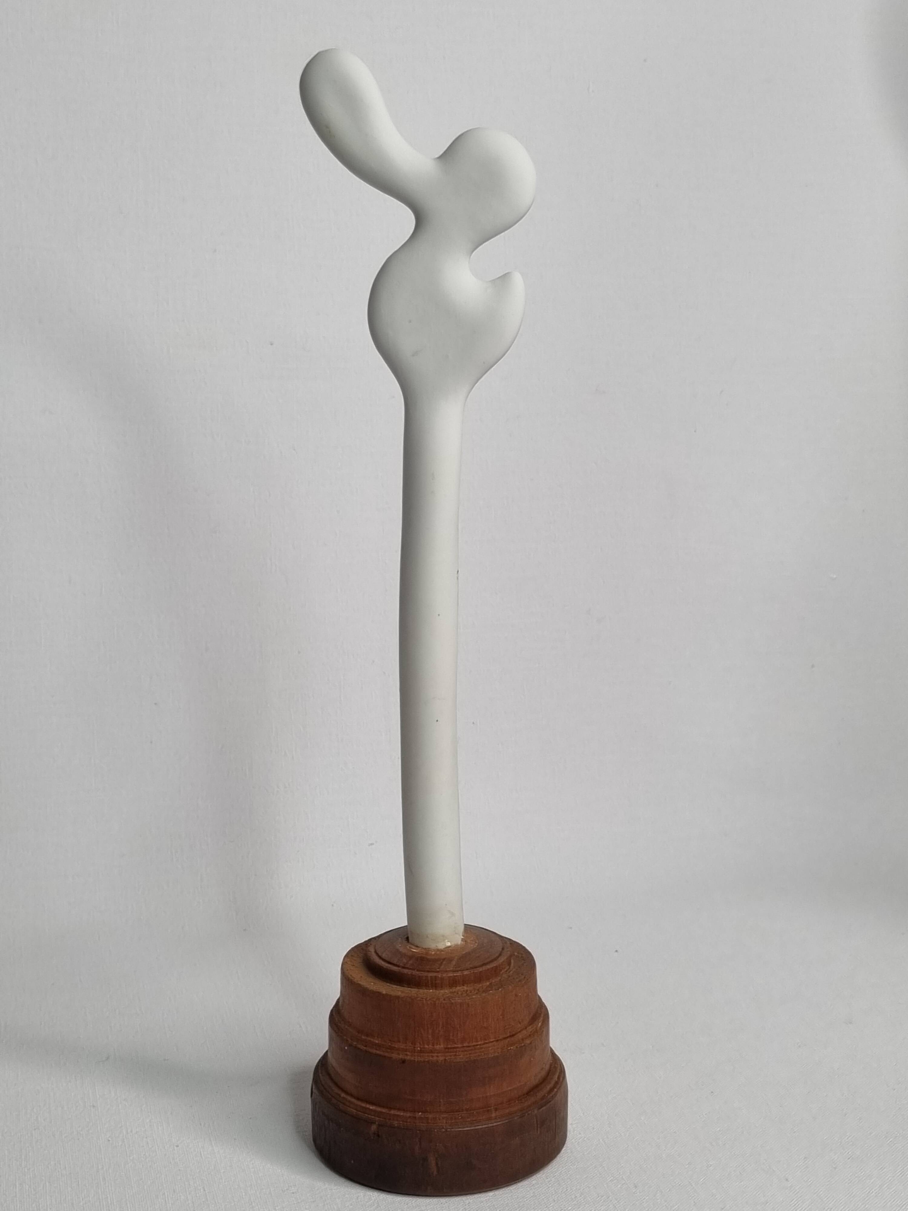 Biomorphic-inspired sculpture, on an industrial wooden base, 28 cm