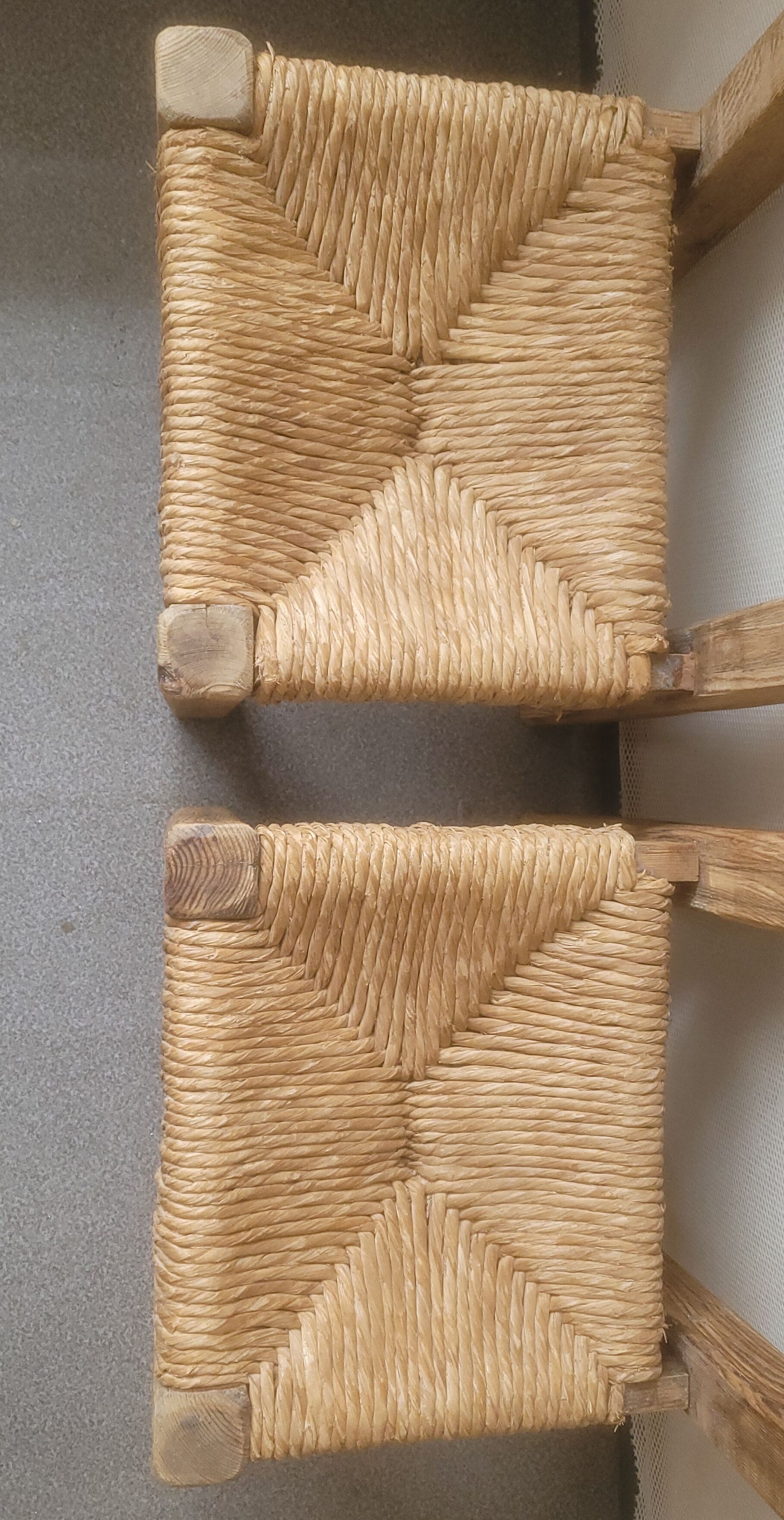 Pair of brutalist chairs in wood and straw