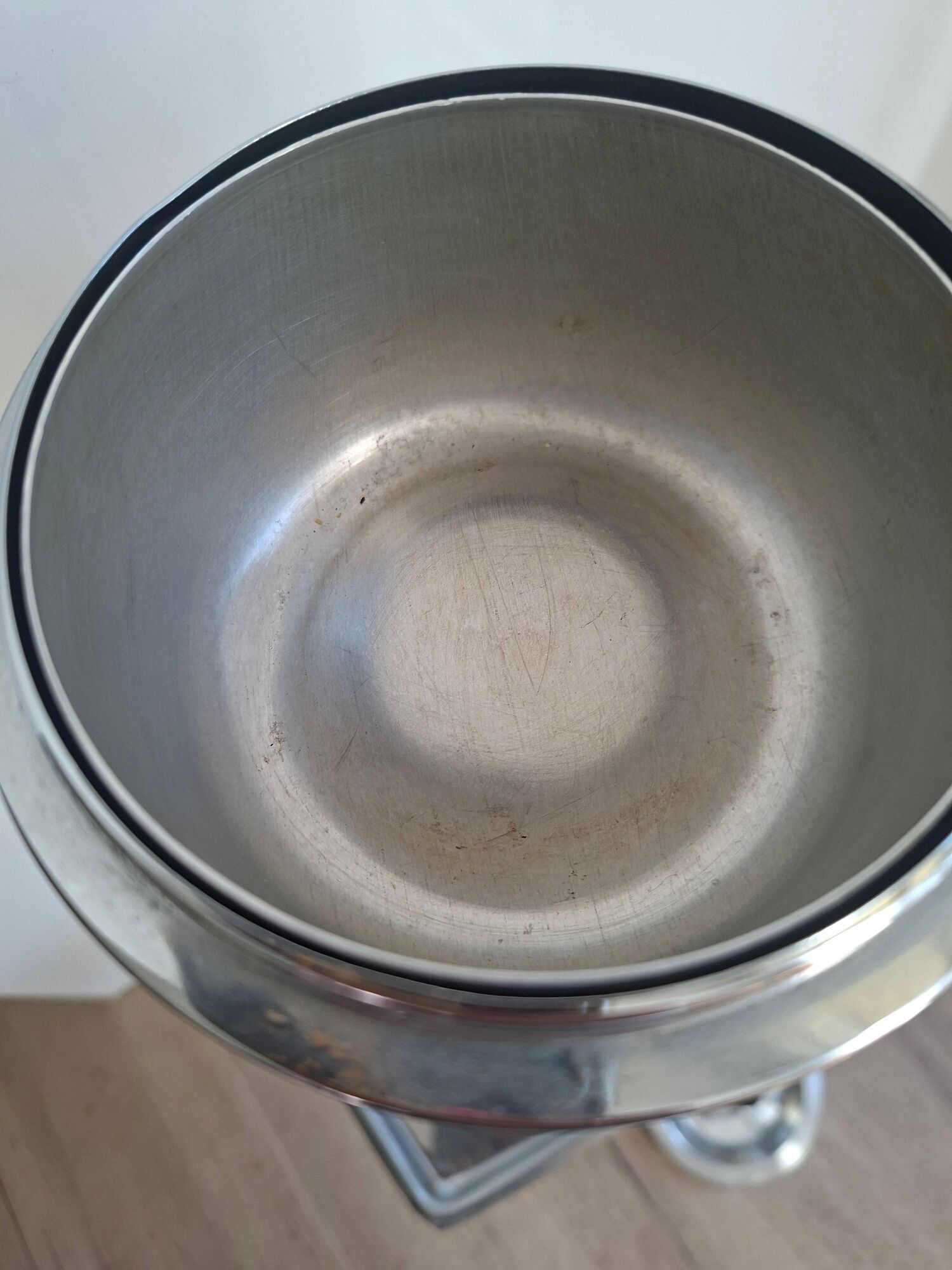 Vintage chrome metal floor ashtray with integrated tray.