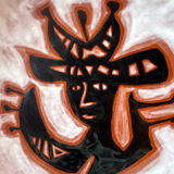 Terracotta plate, Jean Lurçat decorated with a character on a white background.