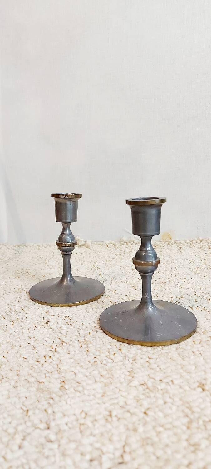 Pair of pewter candle holders